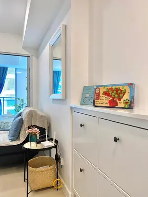 a childs bedroom with a dresser and a window at Azure Daily in Manila