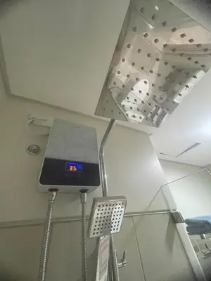 a room with a clock in the corner of a room at Field residences Building 9 in Manila