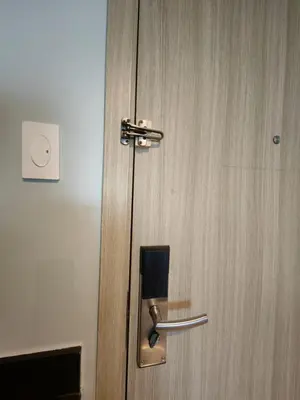a wooden door with a handle in a room at Seaside Sanctuary and Beach Vibes in Manila