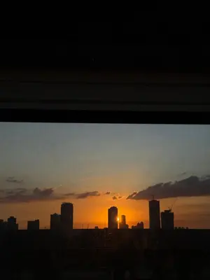 a view of a city skyline at sunset at BnJ Suite Urban Deca w Netflix, Max, YT Premium, FREE parking in Manila