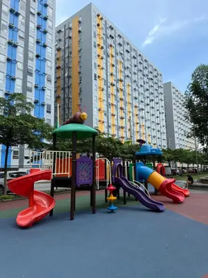 a playground with different colored slides in a park at BnJ Suite Urban Deca w Netflix, Max, YT Premium, FREE parking in Manila