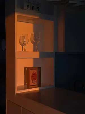 two wine glasses sitting on shelves in a kitchen at BnJ Suite Urban Deca w Netflix, Max, YT Premium, FREE parking in Manila