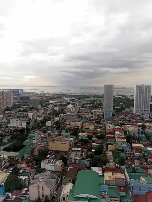 an overhead view of a city with buildings at Condo in Pasay 12th flr studio unit-near MOA, PICC in Manila