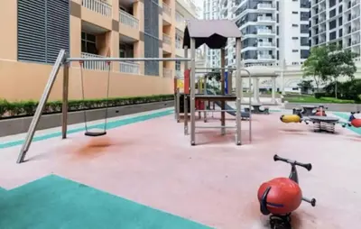 an empty playground with a swing at Classy Venice Grand Studio Balcony Pet friendly, WiFi & Pool in Manila