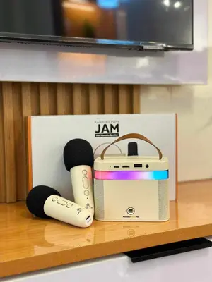 a toaster and two remotes sitting on a shelf at HomeSuiteHome, Shore 3 Residences Moa Complex, Pasay City in Manila