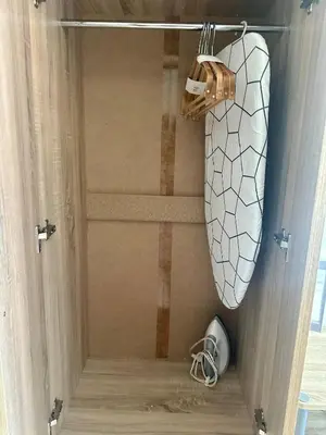 a bathroom with a shower with a toilet in it at Mall of Asia Staycation with fast wifi and google tv in Manila