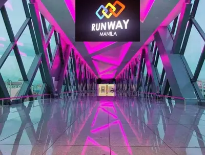 a hallway with pink lighting in a building at Kyedenz Unit -Two Palm Tree Villas Newport Naia T3 in Manila