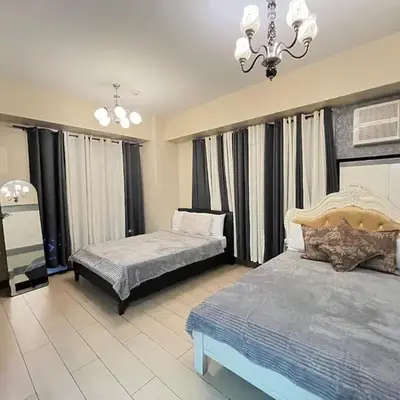 Kyendenz Condotel-Across Naia T3 Pool View with Wifi