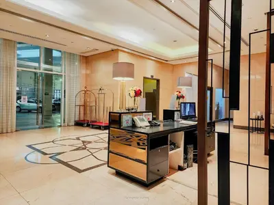 an office with a desk with a computer in it at One Bedroom Unit with Venice Canal View in Manila