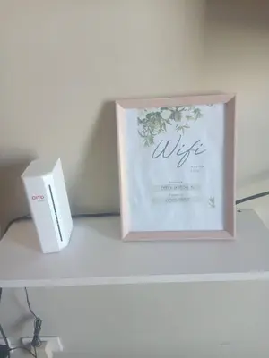 a picture frame sitting on top of a table at Affordable Condoatel Hotel Near Naia 1,2,34 in Manila
