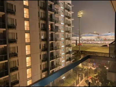 a view from the balcony of a building at night at Affordable Condoatel Hotel Near Naia 1,2,34 in Manila