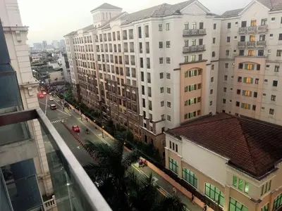 a view of a city street with tall buildings at Affordable Condoatel Hotel Near Naia 1,2,34 in Manila
