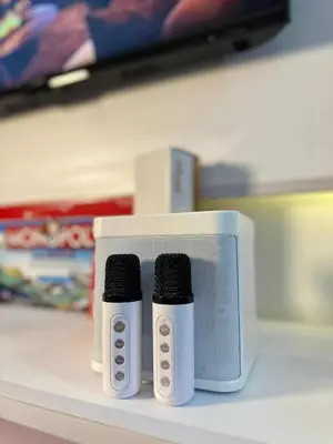 two white and black bottles sitting on a shelf at Aurbana Staycation in Manila