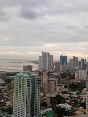 a view of a city with tall buildings at Condo in Pasay 12th flr studio unit-near MOA, PICC in Manila
