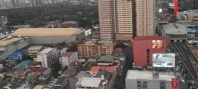 an overhead view of a city with tall buildings at JJMC PLACE 28 With Netflix and Unli Wifi in Manila