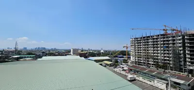 a view of a city with a building at In My Jib Sucat in Manila