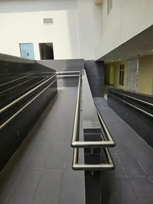 a row of empty bowling lanes in a building at Luxury apartment at Park McKinley West suite 1 in Manila