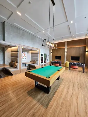 a billiard room with a pool table in it at Luxury apartment at Park McKinley West suite 1 in Manila