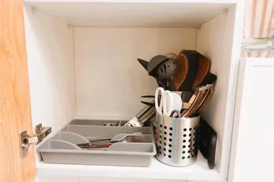 a kitchen drawer with utensils in it at F&M Deluxe Holiday Suite MOA SHORE 3 Residences