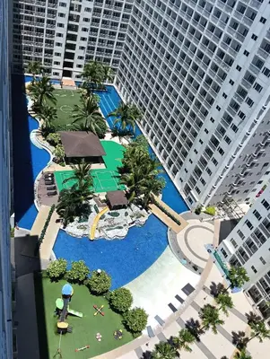 an aerial view of a resort with tall buildings at Shore residences Tower D pool view Unit in Manila