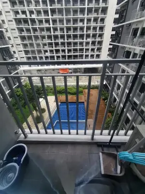a view from the balcony of a building at Mall of Asia residence Shore 3 in Manila