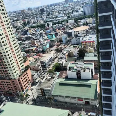 an aerial view of a city with tall buildings at Homefort Twin Bed Suite - Red Residences Unit 2626 in Manila