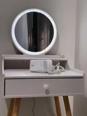a mirror on top of a dresser with a camera at Peaceful Pasay Getaway - Private Studio with Pool in Manila