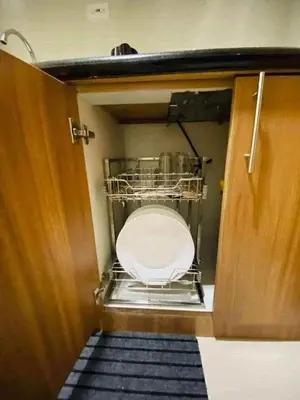 a bathroom with a toilet sitting inside of a door at Shore Residence 3 tower 1 Amenity view MOA Terminal 3 in Manila