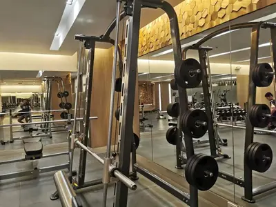 a gym with a row of tread machines at Mall of Asia gateways shore 3 condotel in Manila