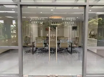 a conference room with a table and chairs in a building at Airport Home Base Trips Getaways 3pax balcony 6g in Manila