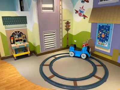 a childs room with a toy train on a track at Airport Home Base Trips Getaways 3pax balcony 6g in Manila