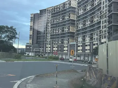 a large building with a street in front of it at Airport Home Base Trips Getaways 3pax balcony 6g in Manila