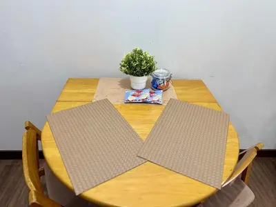 a wooden table with a plant on top of it at LaVerti 1BR Affordable staycation groups family in Manila
