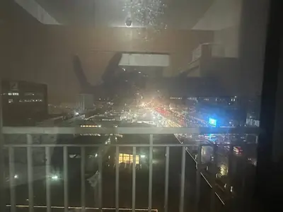 a view of a city at night from a balcony at Relax in Pasay City at Shell Residences - Your Home Away from Home in Manila