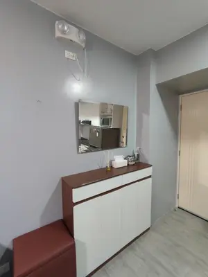a kitchen with a counter and a mirror at 1Bedroom for rent Amaia Skies Shaw in Manila