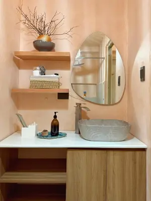 a bathroom with a sink and a mirror at Zen Staycation with City and Sunset View near Airport and Mckinley in Manila