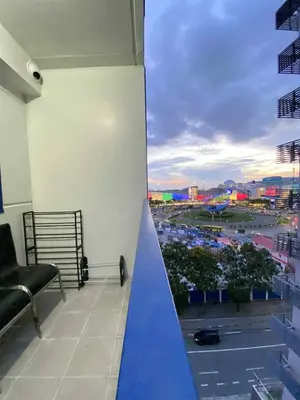 a balcony with a view of a parking lot at The Tenth Balcony in Manila