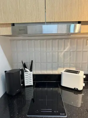 a kitchen counter top with a toaster and a toaster at Mujihomes - 1BR SMDC Fame Residences Mandaluyong in Manila