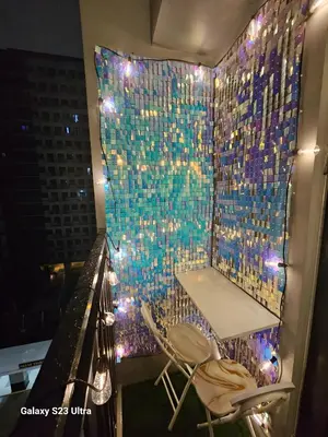 a room with a table and a glass wall at Staycation near MOA, SMX Convention, DFA & NAIA, in Manila