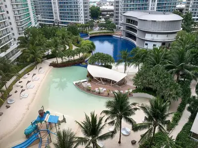 an aerial view of a resort with a swimming pool at 2BR Unit Azure Urban Resort Residences in Manila