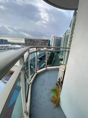 a view from the top of a balcony of a building at 2 bedroom azure cityview 1 in Manila