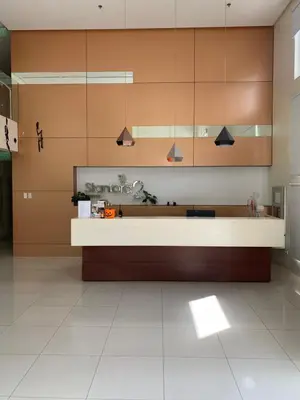 a kitchen with a counter in a room at M&L Condotel in Santo Domingo