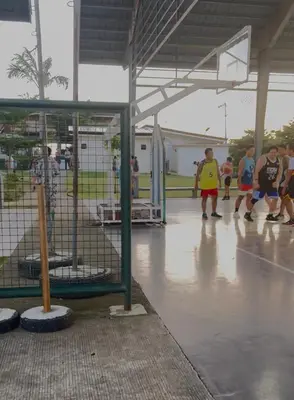 a group of people playing a game of basketball at Transient Room in Dasmariñas