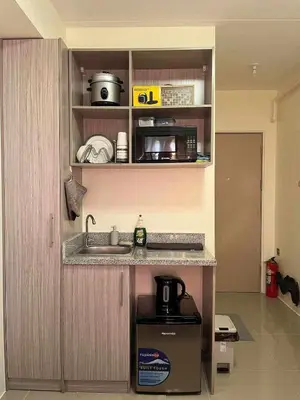 a kitchen with a sink and a counter top at Aesthetic Studio Unit at Deca Cubao QC in Manila