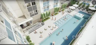 an overhead view of a swimming pool in a building at DongStay in Bayabasan