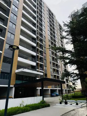 a large apartment building with a pavilion in front of it at Casa Dreamer in Taytay