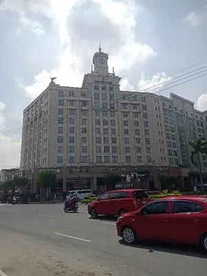 a large building with a clock tower on top of it at 150 Newport Boulevard - North Wing in Manila