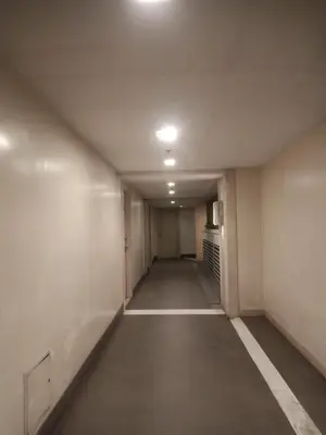 an empty hallway in an office building at 150 Newport Boulevard - North Wing in Manila