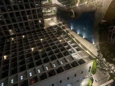 an overhead view of a tall building at night at Shore 2 tower 1 staycation in Manila