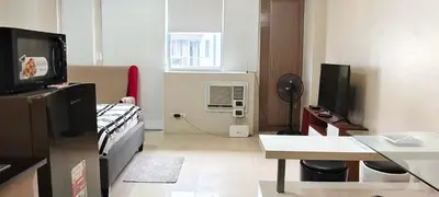 a hospital room with a bed and a television at Cozy condy at One palm villa across NAIA T3 in Manila